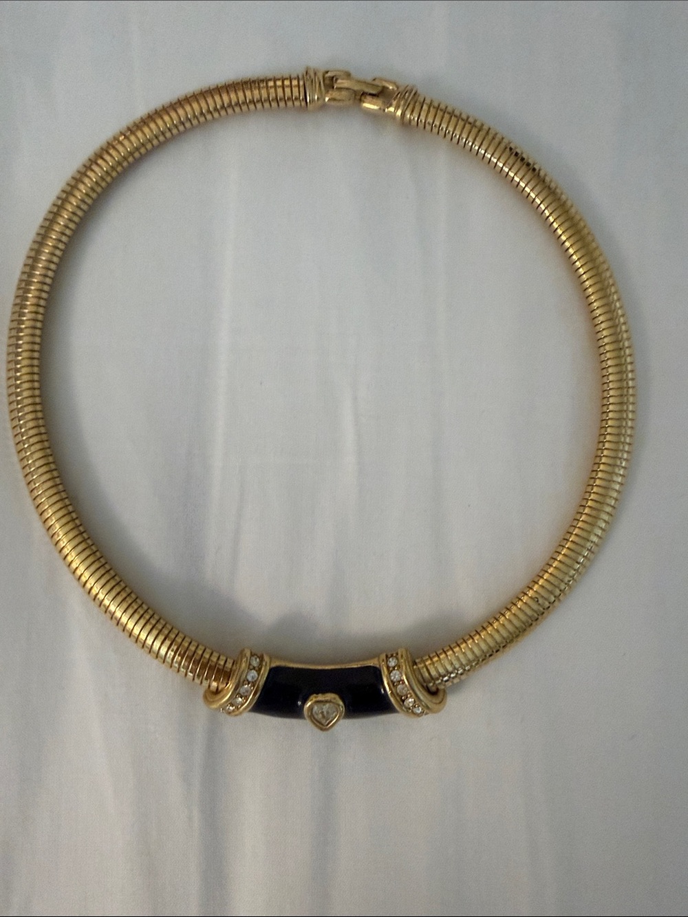 vintage 1980s Monet omega choker necklace. Polished gold-plated finish